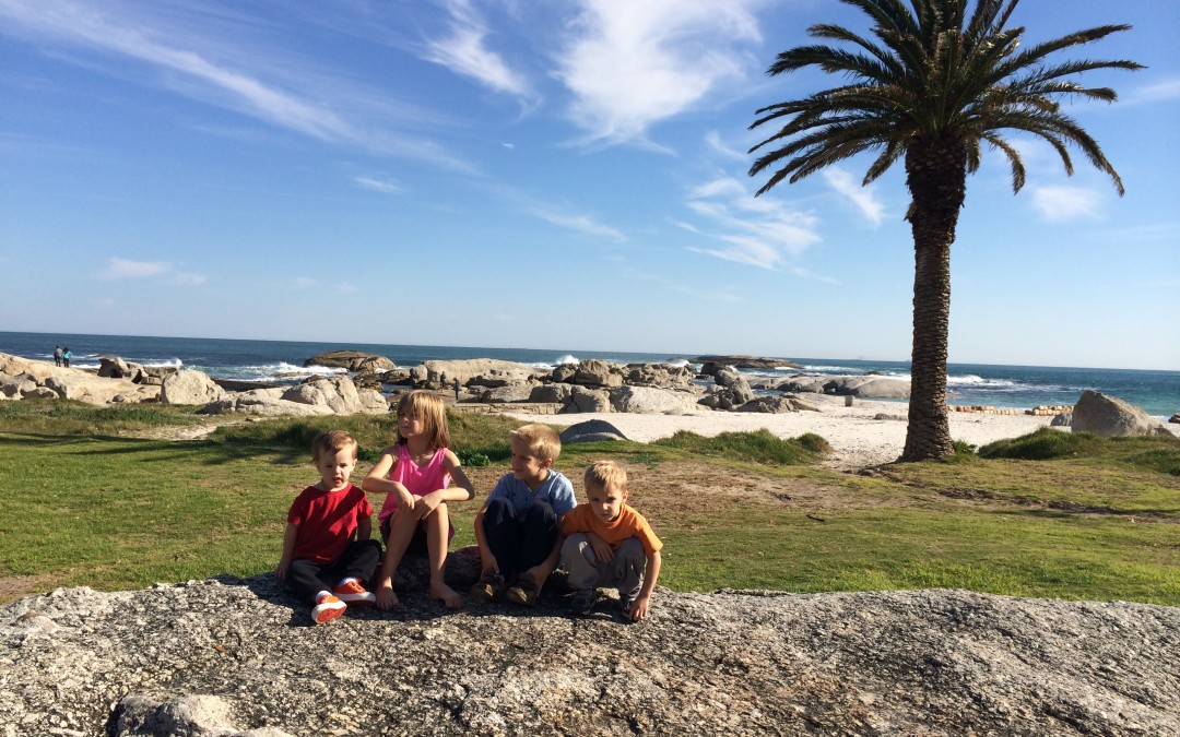 4 Kids on the beach in Cape Town South Africa